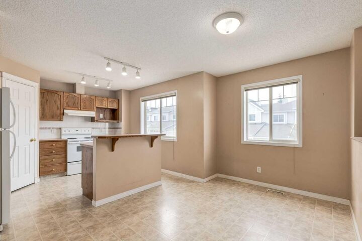 Property Photo:  109 Hidden Creek Gardens NW  AB T3A 6J4 