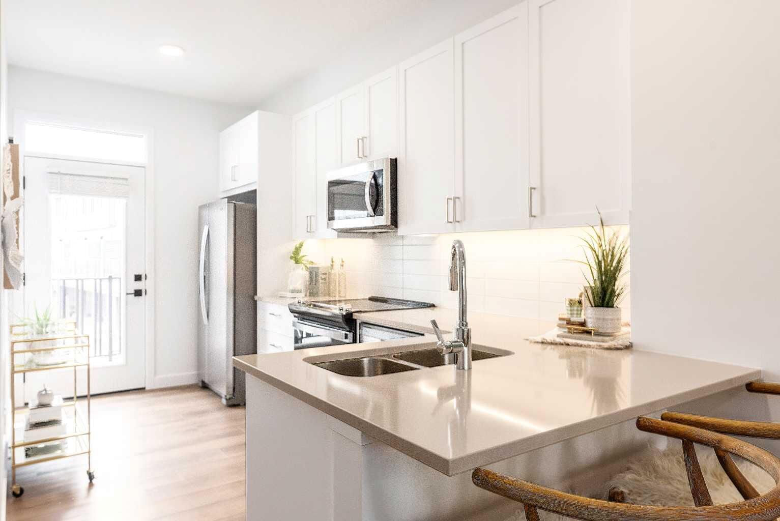 Property Photo: 272 Heirloom Crescent SE 106 AB T3S 1H2