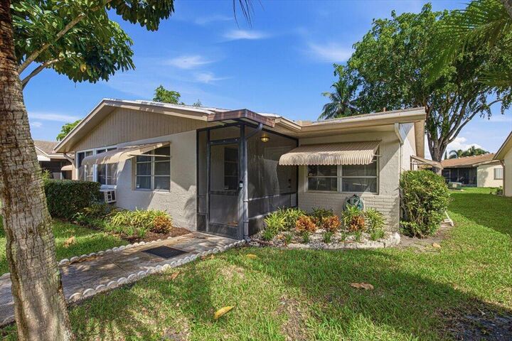 Property Photo: 6069 La Palma Lane FL 33484