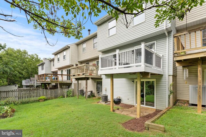 Property Photo: 311 Sloping Woods Court MD 21409