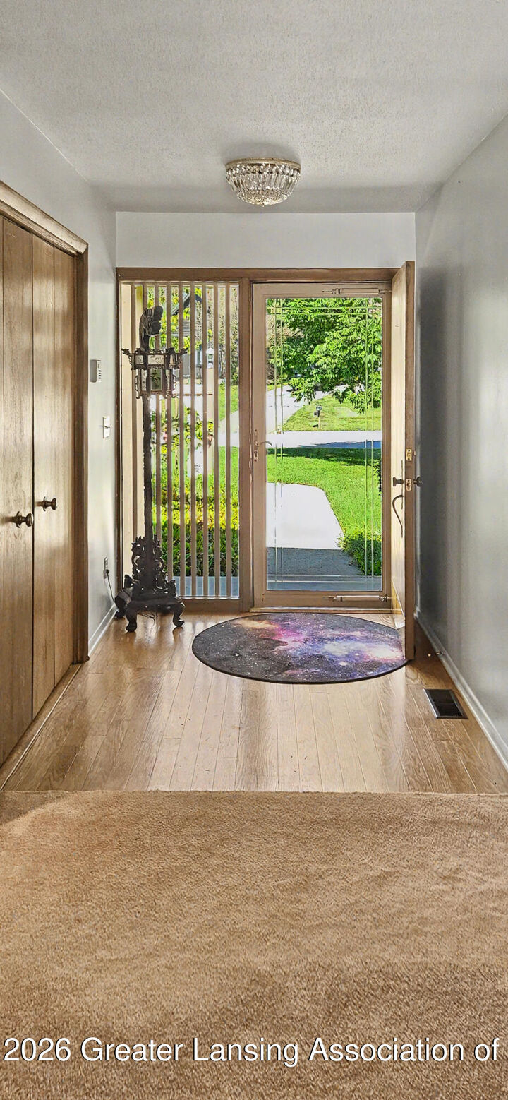 Property Photo:  1775 Mirabeau Drive  MI 48864 