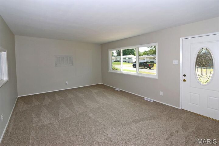 Property Photo:  1395 Ensenada Drive  MO 63031 