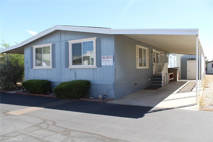 Property Photo:  14000 El Evado 78  CA 92392 