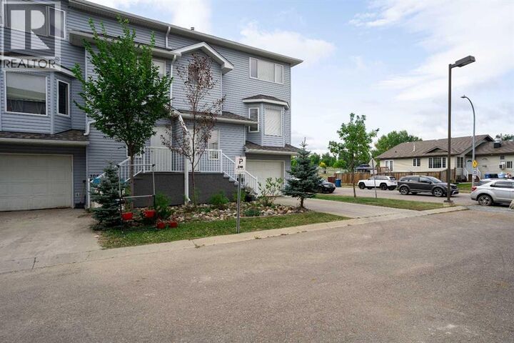 Property Photo:  104 Loutit Road  AB T9K 0A2 