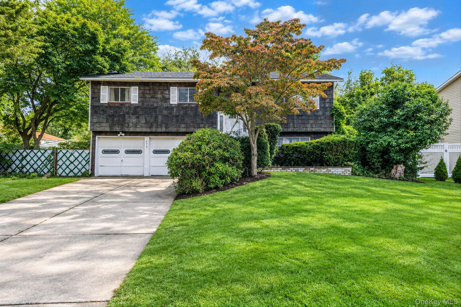 Property Photo:  575 Freeman Avenue  NY 11717 