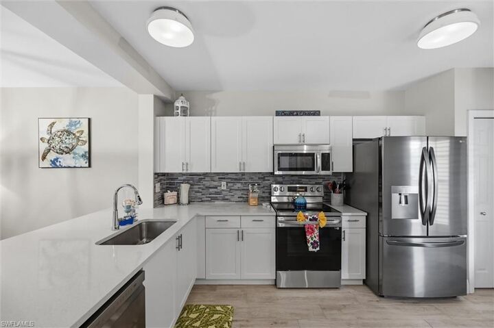 Property Photo: 9165 Celeste Dr 103 FL 34113