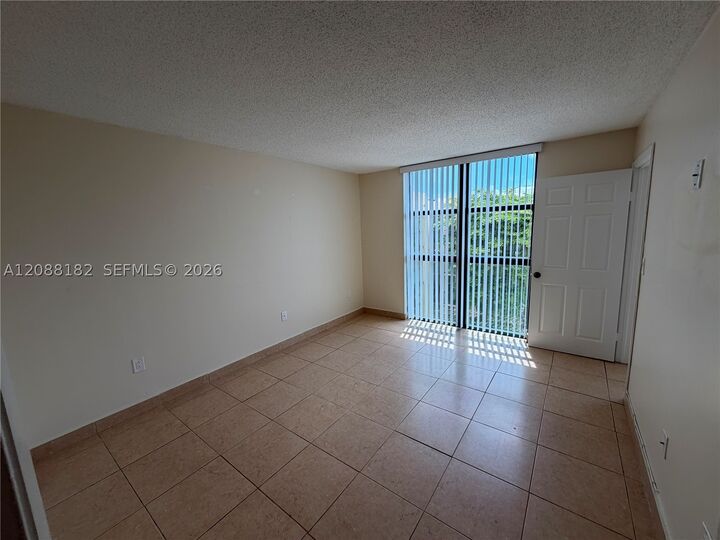 Property Photo:  11780 SW 18th St 501-2  FL 33175 