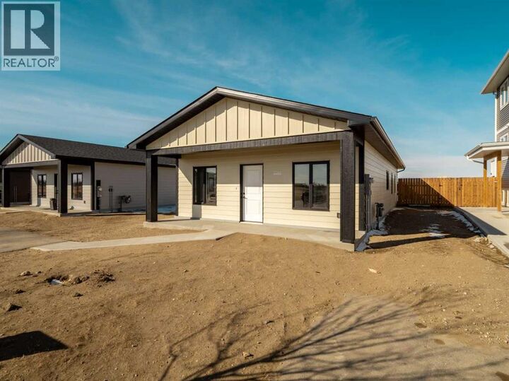 Property Photo:  7046 48 Street  AB T1G 0G7 
