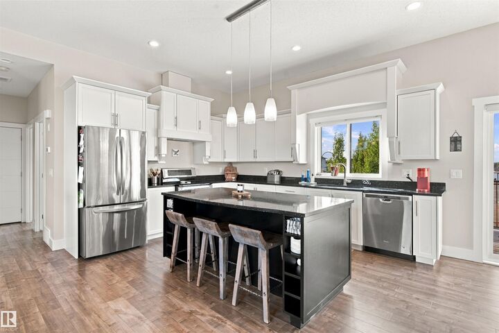 Property Photo:  6730 Tri City Way  AB T9M 0L2 