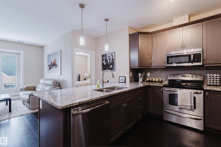 Property Photo:  6079 Maynard Way NW 142  AB T6R 0S4 