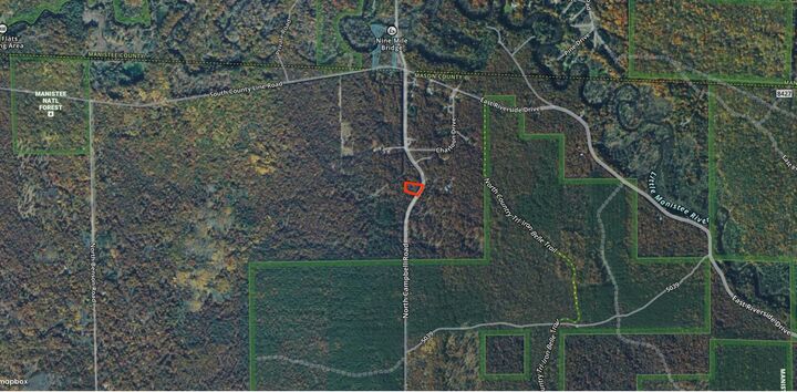 Property Photo:  11571 N Campbell Road  MI 49660 