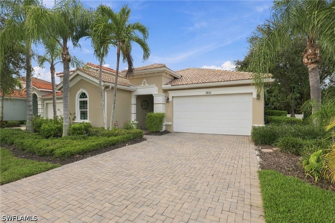 Property Photo: 1651 Sanctuary Pointe Drive FL 34110