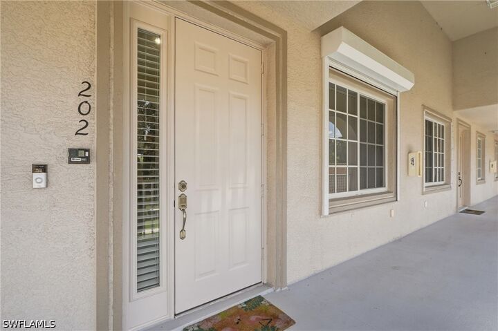 Property Photo:  1112 Manor Lake Drive 202  FL 34110 