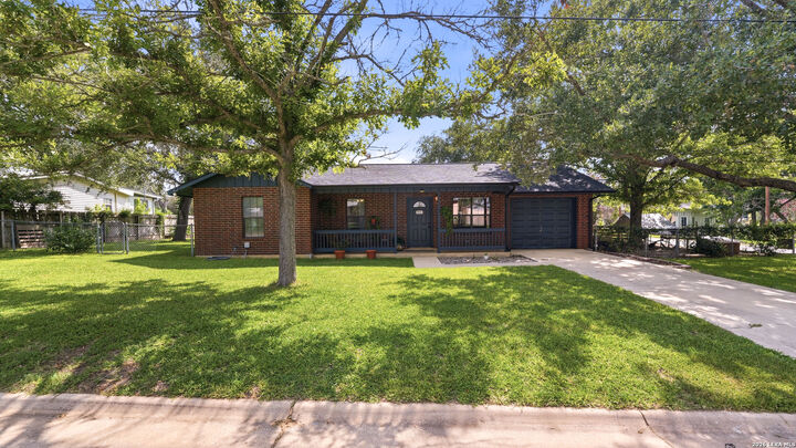 Property Photo: 208 E Mayer St TX 78160