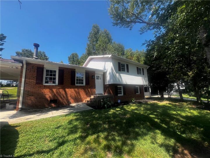 Property Photo:  5511 Windemere Circle  NC 27370 