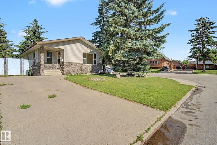 Property Photo:  6237 13 Avenue NW  AB T6L 2E5 
