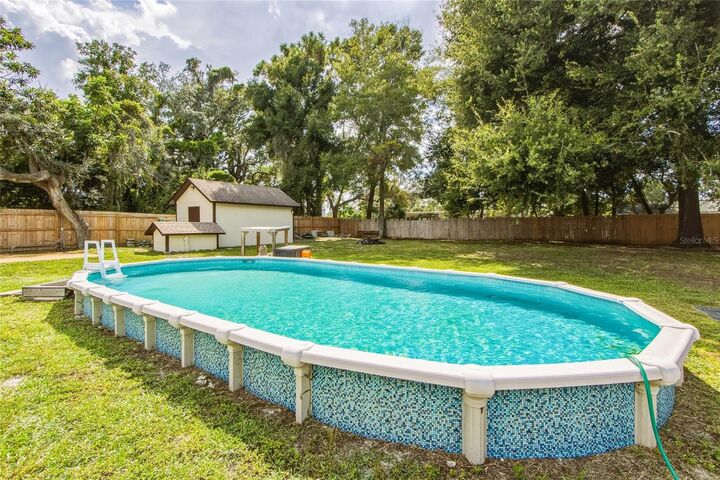 Property Photo:  14807 Scamp Drive  FL 34667 