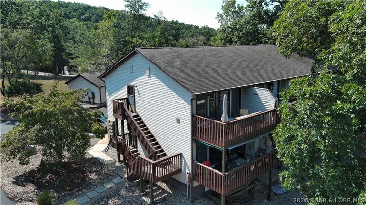 Property Photo:  6620 Weston Point Drive H1  MO 65065 