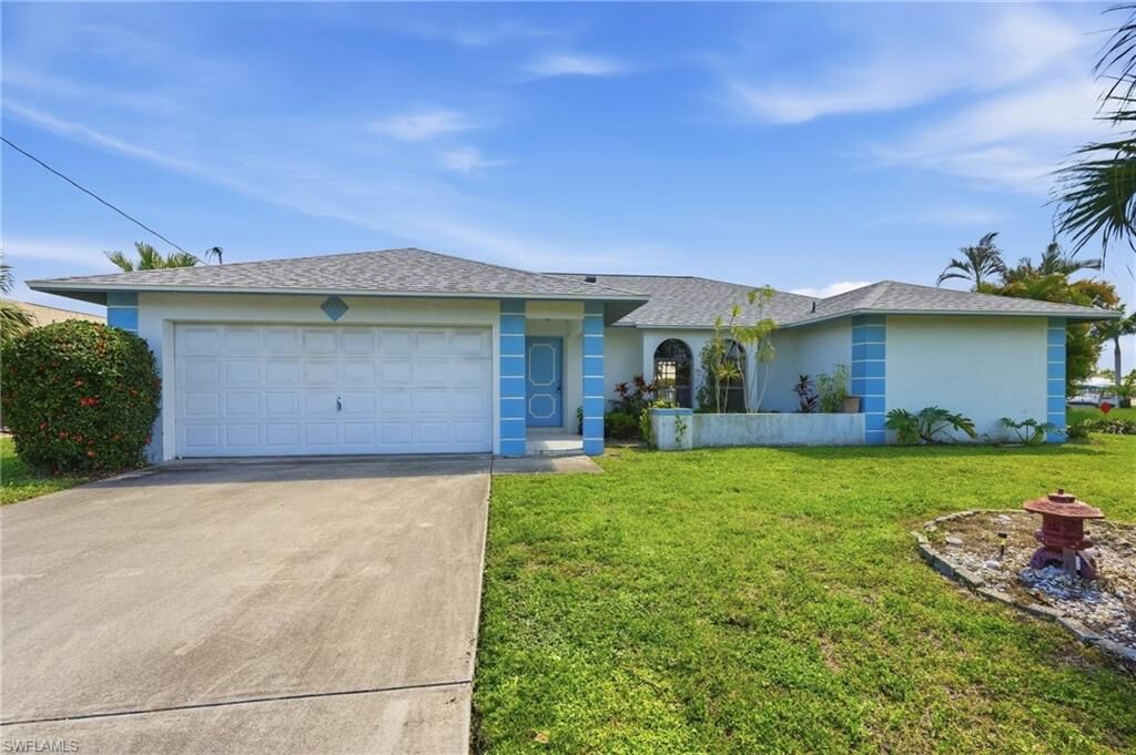Property Photo:  202 SE 37th Ter  FL 33904 