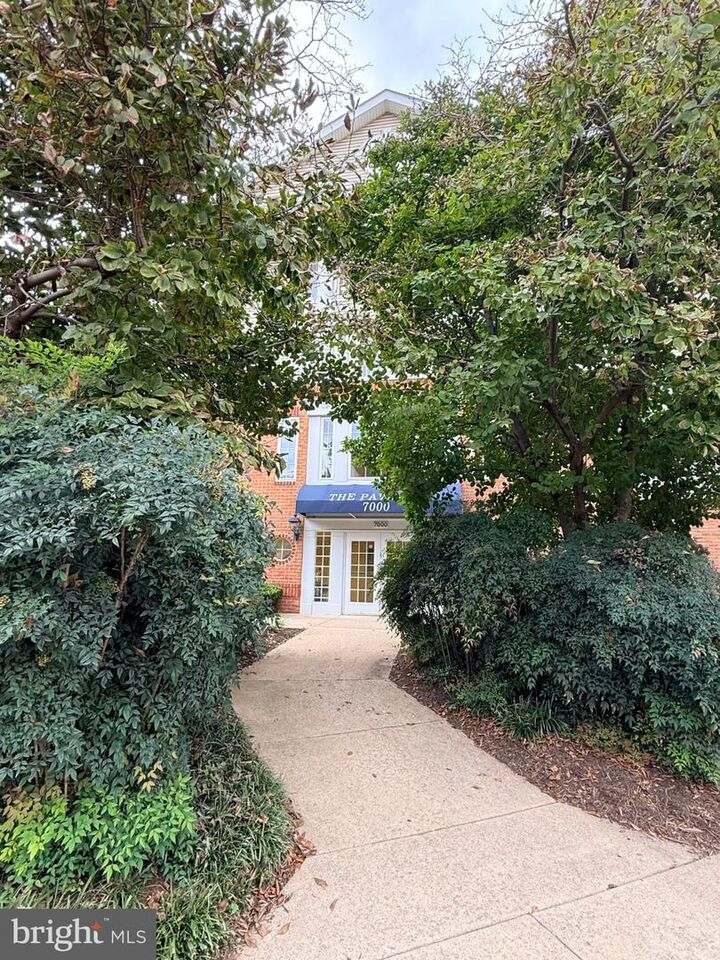 Property Photo: 7000 Falls Reach Drive 203 VA 22043