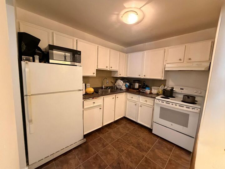 Property Photo:  32850 George Ferguson Way 229  BC V2S 7K1 