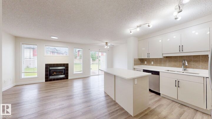 Property Photo:  1150 37B Avenue NW  AB T6T 0E6 