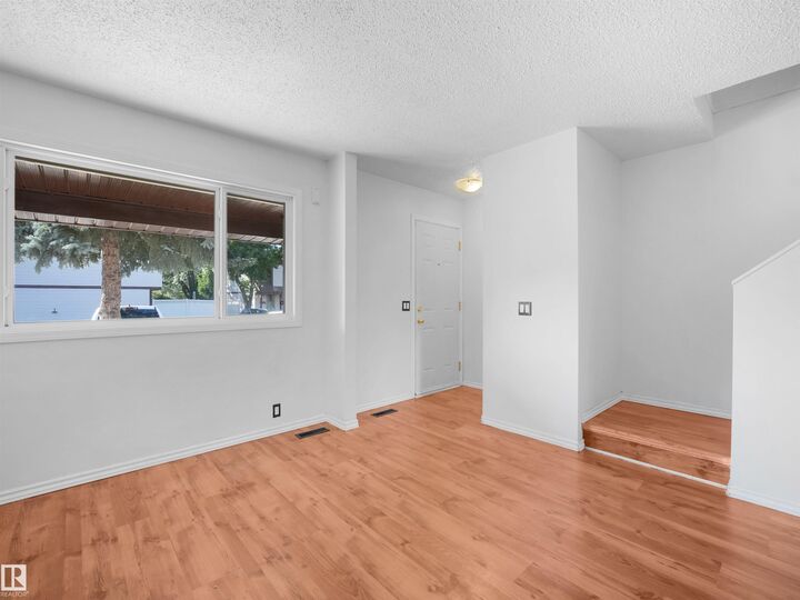 Property Photo:  13833 30 Street NW 22  AB T5Y 2B2 