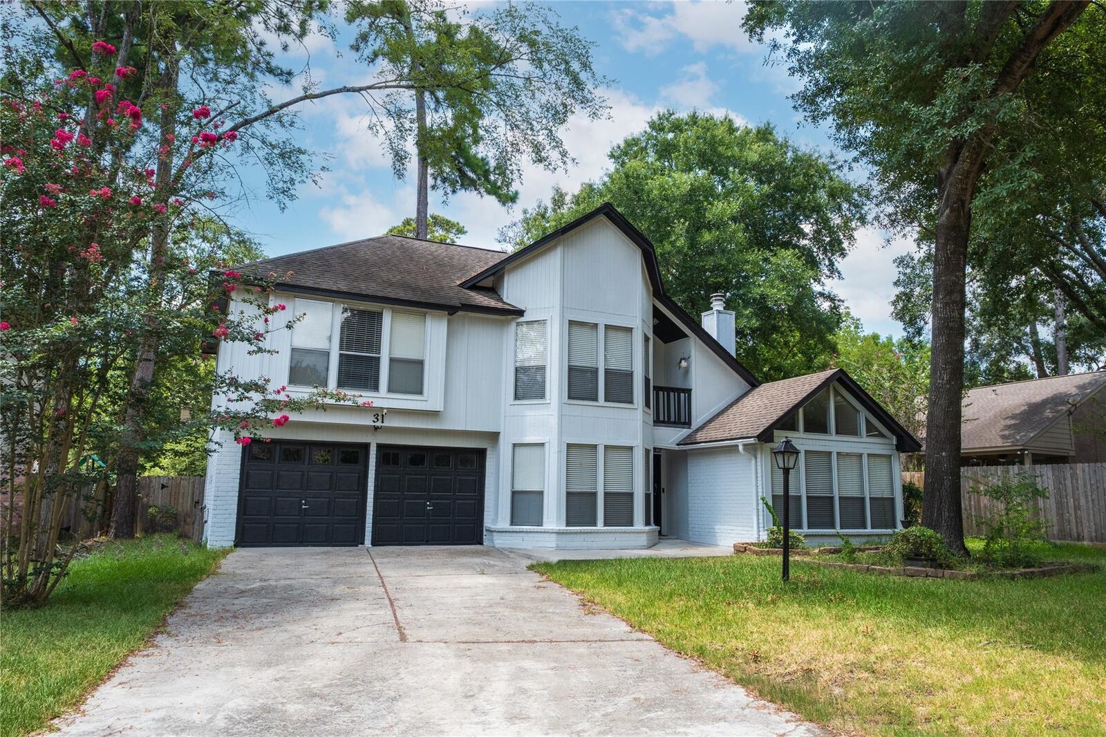 Property Photo:  31 N Drifting Leaf Court  TX 77380 