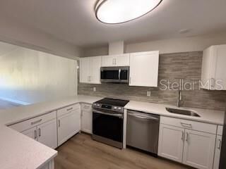 Property Photo:  3505 Tarpon Woods Boulevard J408  FL 34685 