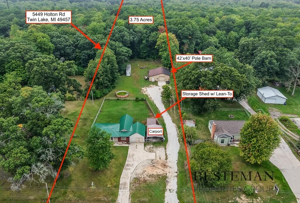 Property Photo:  5449 Holton Road  MI 49457 