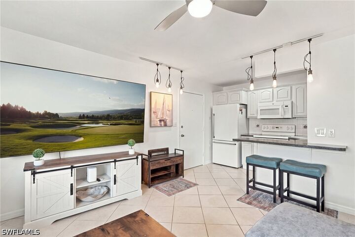 Property Photo:  457 Tallwood Street 408  FL 34145 