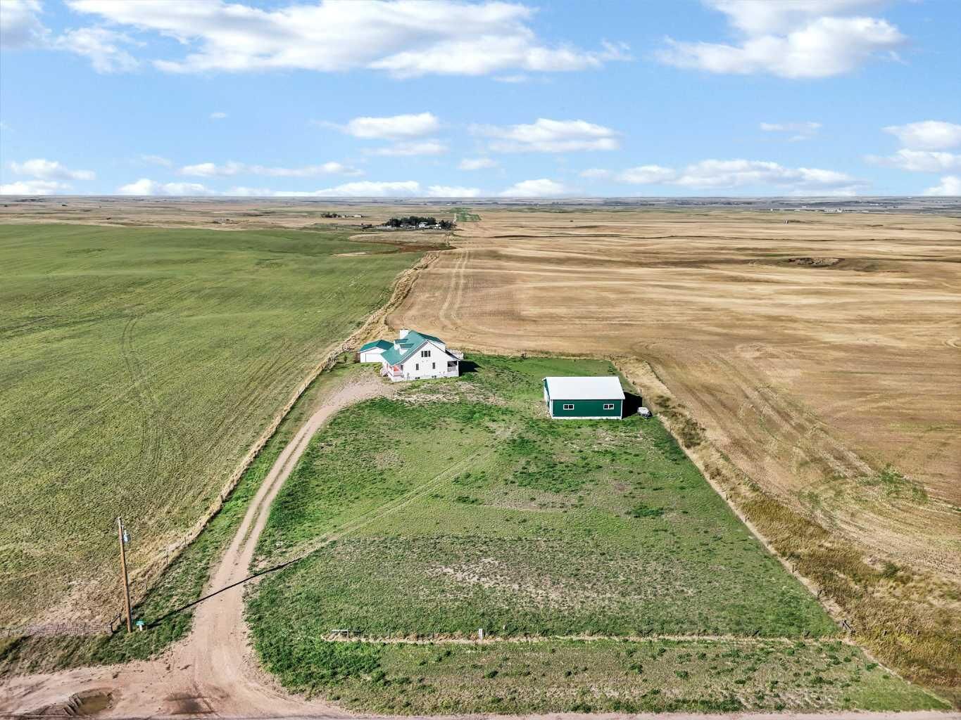 Property Photo:  10302 Black &Amp White Trail  AB T1B 0L1 