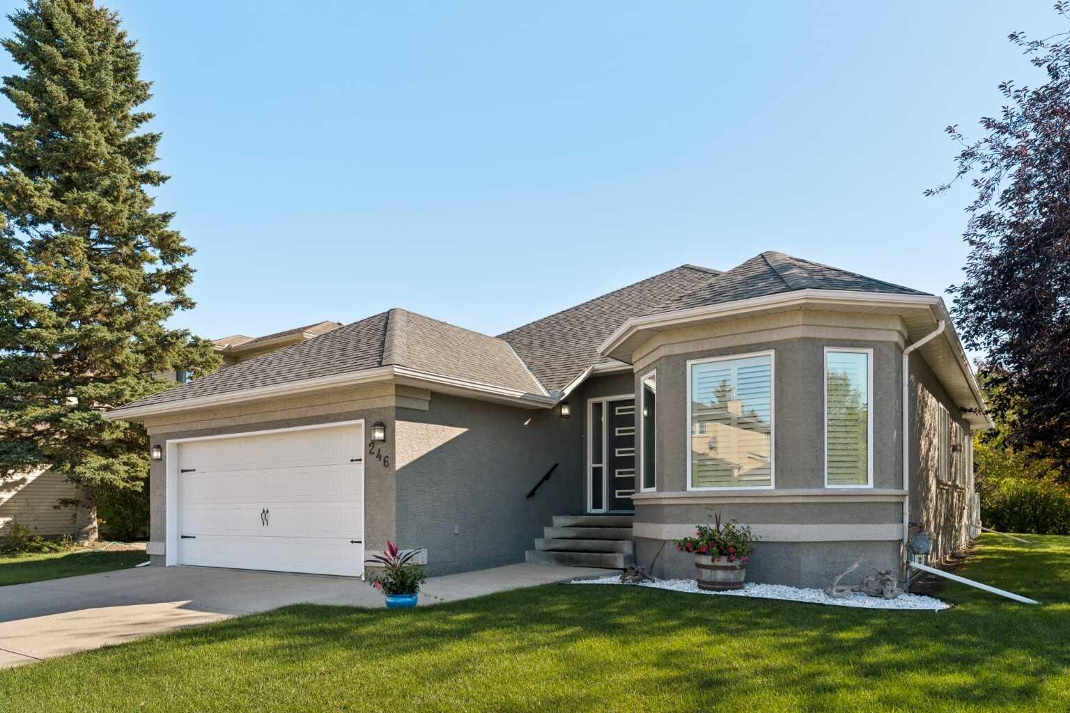 Property Photo:  246 Woodpark Green SW  AB T2W 6E9 
