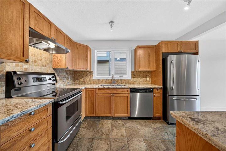 Property Photo:  6407 34 Avenue NW  AB T3B 1M9 