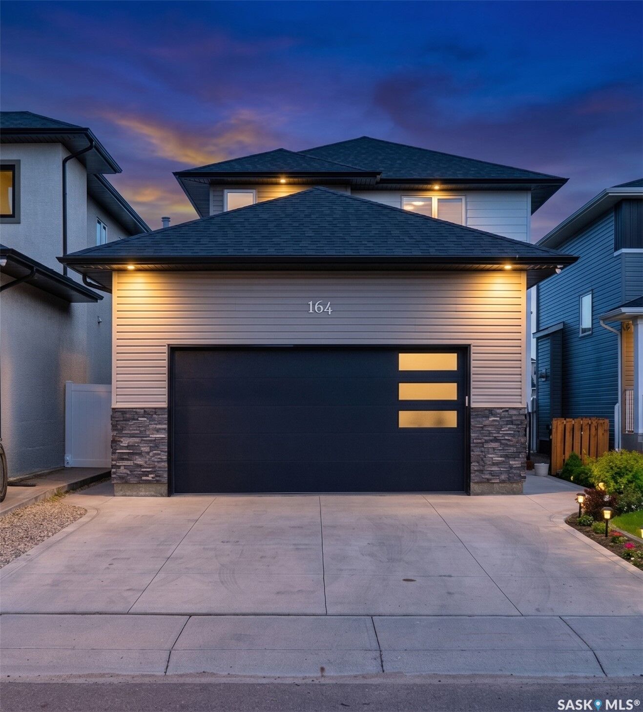 Property Photo:  164 Thakur Street  SK S7W 1C4 