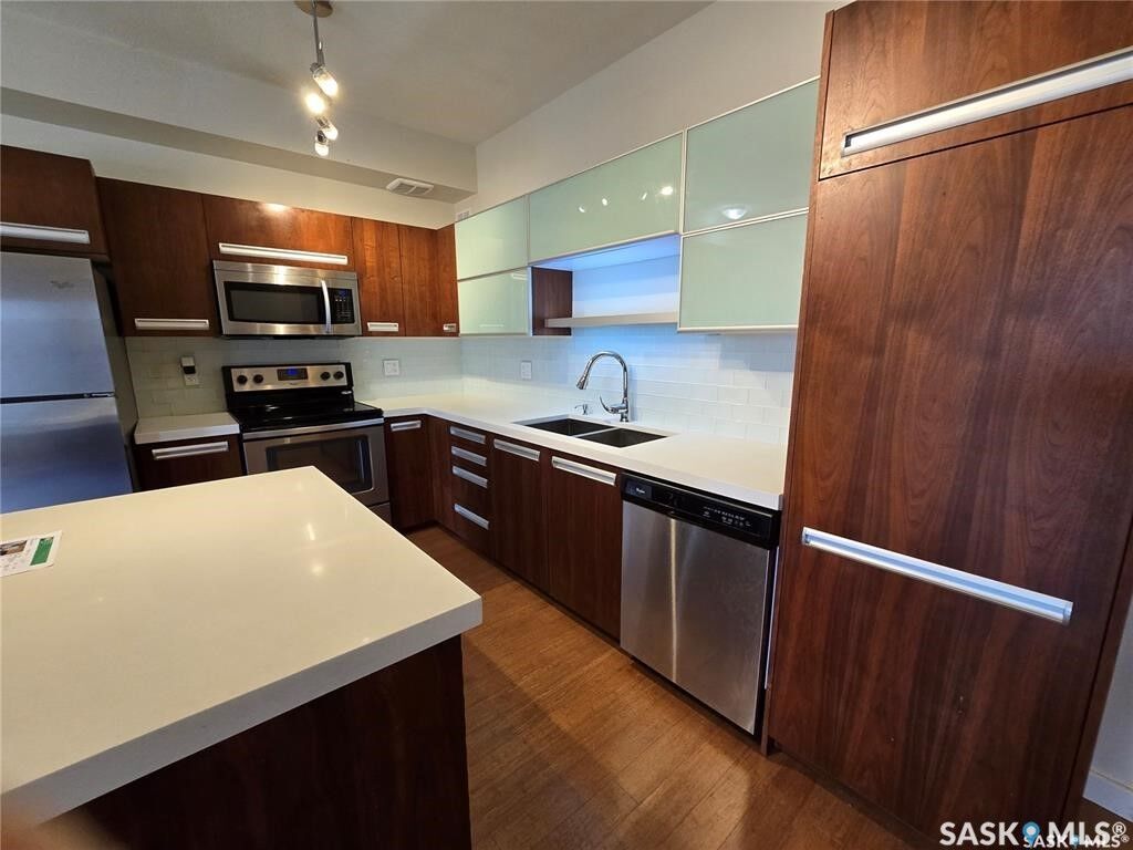 Property Photo:  1015 Patrick Crescent 1610  SK S7W 0M3 