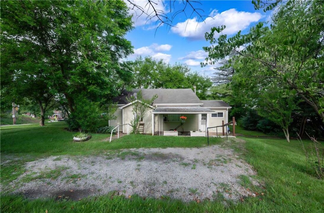 Property Photo:  411 Harmony Rd  PA 15005 