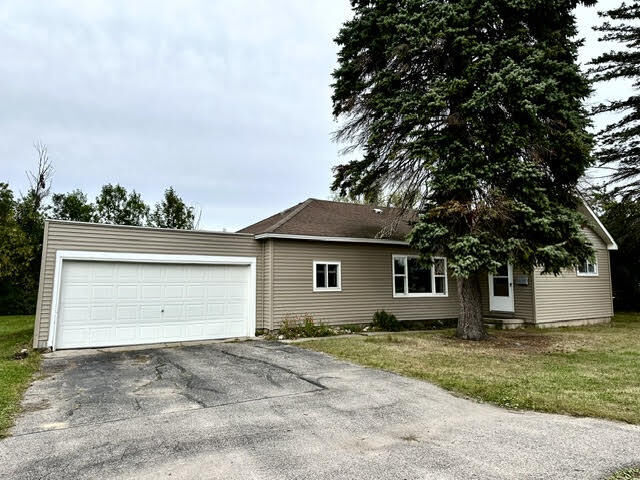 Property Photo:  950 Locust Street  MI 49721 