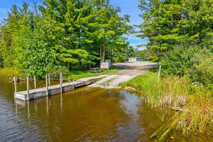 Property Photo:  3266 Long Rapids Road  MI 49707 