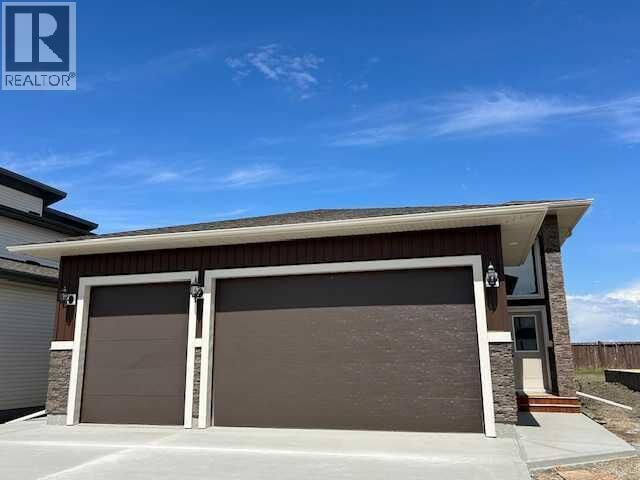 Property Photo: 11401 Wisteria Court AB T8V 1L1