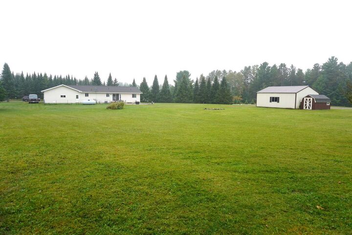 Property Photo:  W7380 Mathews Road  WI 54452 