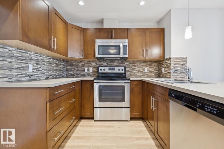 Property Photo:  1031 173 Street SW 318  AB T6W 3E4 