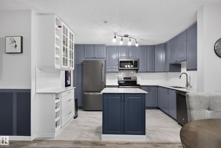 Property Photo: 2098 Blackmud Creek Drive SW 118 AB T6W 1T7