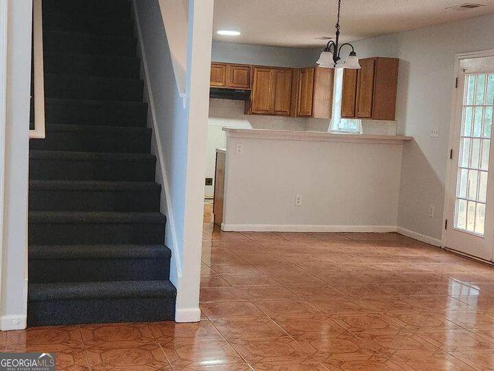 Property Photo:  10883 Knotty Pine Place  GA 30228 