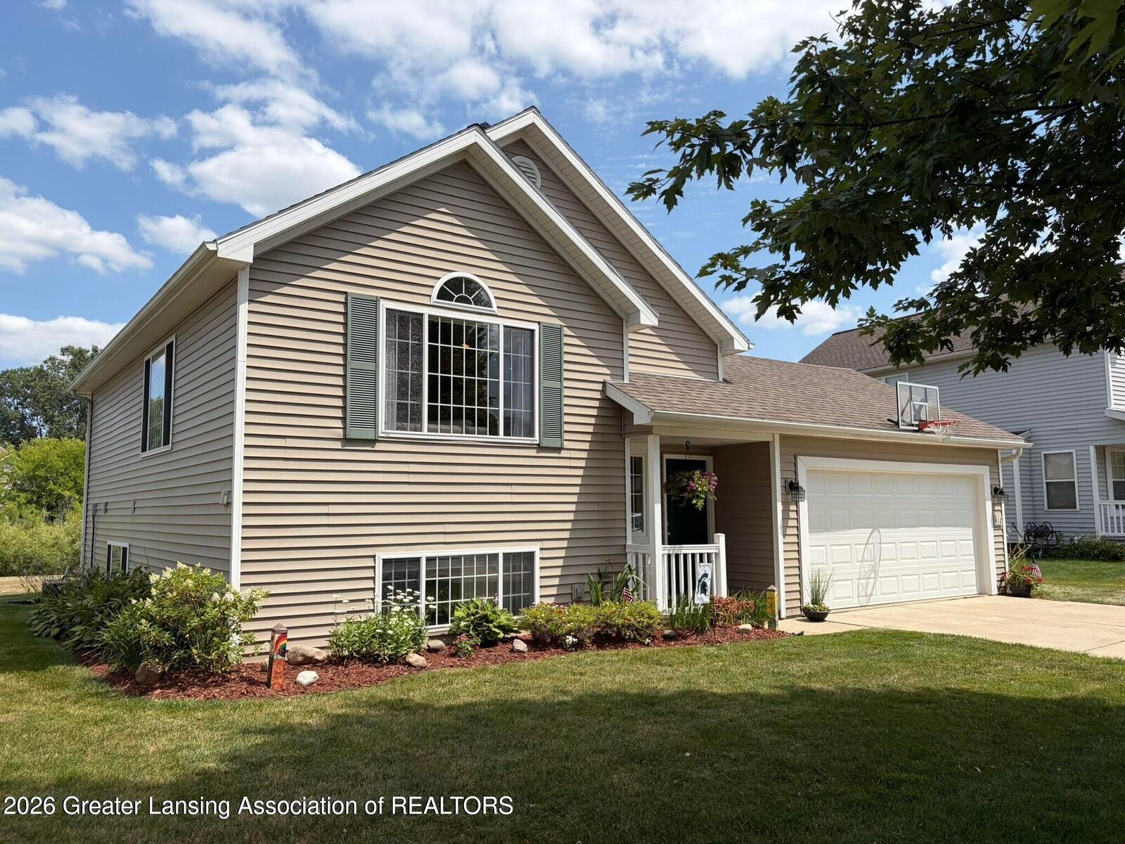 Property Photo:  412 Coventry Lane  MI 48854 
