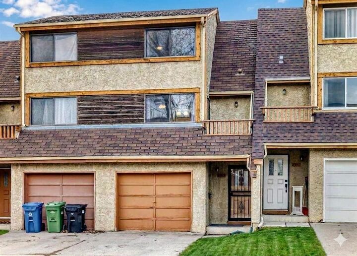 Property Photo: 6909 Ranchero Road NW AB T3G 1J6