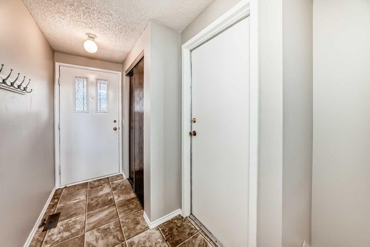 Property Photo: 6909 Ranchero Road NW AB T3G 1J6