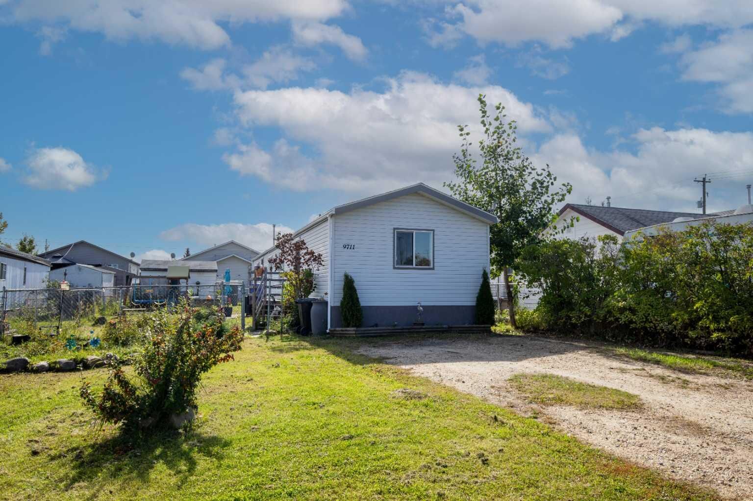 Property Photo:  9711 103 Avenue  AB T8X 5E9 