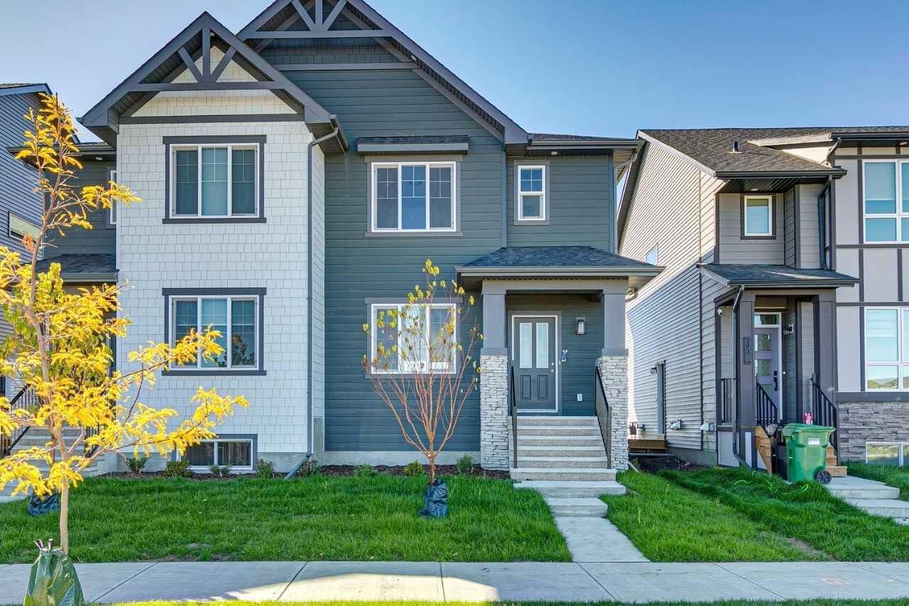 Property Photo: 297 Creekside Drive SW AB T2X 4A8