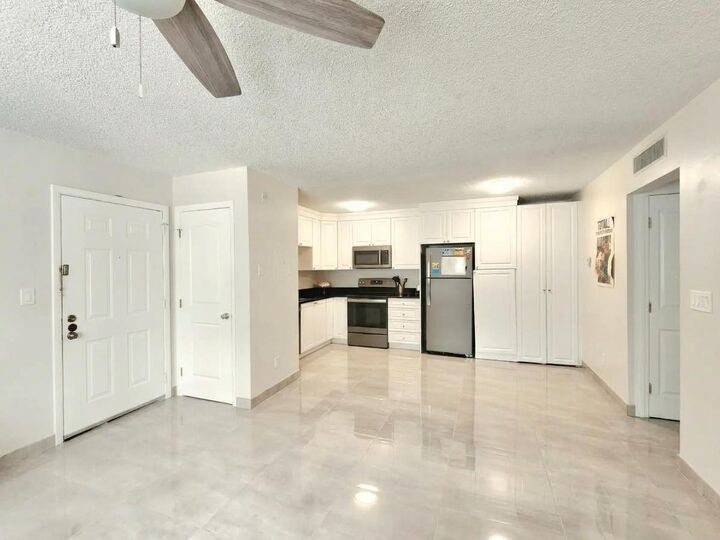Property Photo: 651 Lyons Road 10107 FL 33063